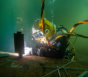 Submerged welding is a specialized skill for repairing structures and piping located beneath the surface of a body of water.