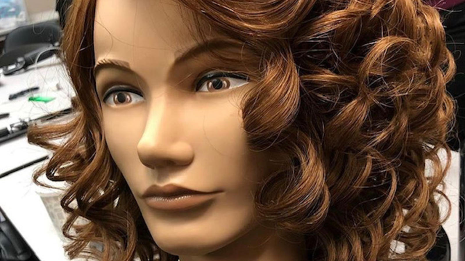 Hairstyling manikins are used to practice different techniques