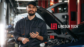 Skilled auto mechanic in an automotive repair facility.