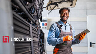Diesel Mechanic in New Jersey maintaining a truck.