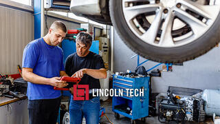 Two Philadelphia-based auto mechanics at work.