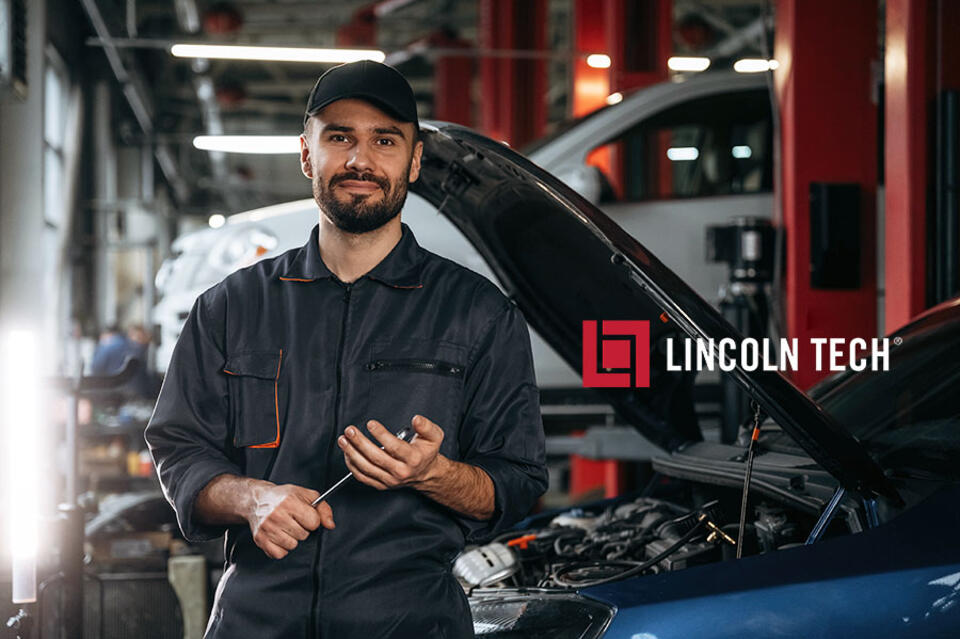 Skilled auto mechanic in an automotive repair facility.