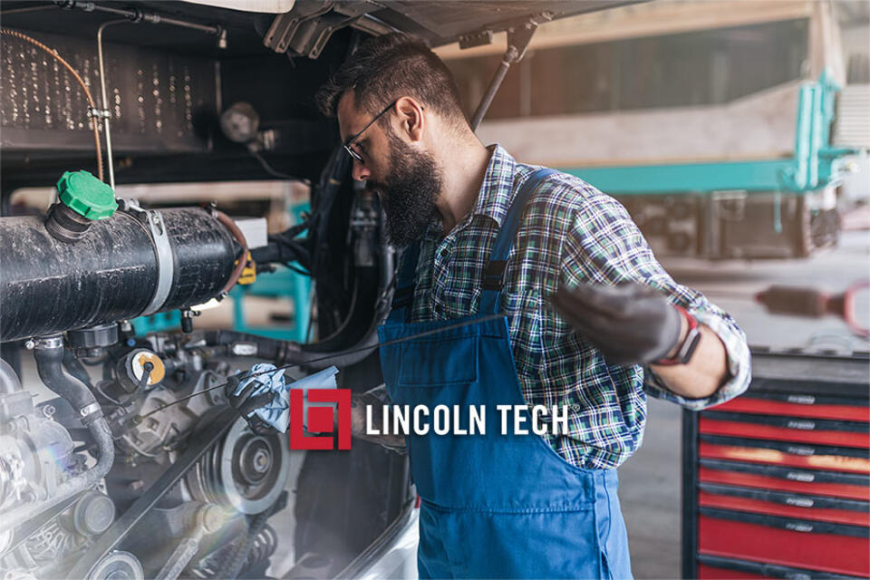 Diesel Mechanic in Texas maintaining a bus.