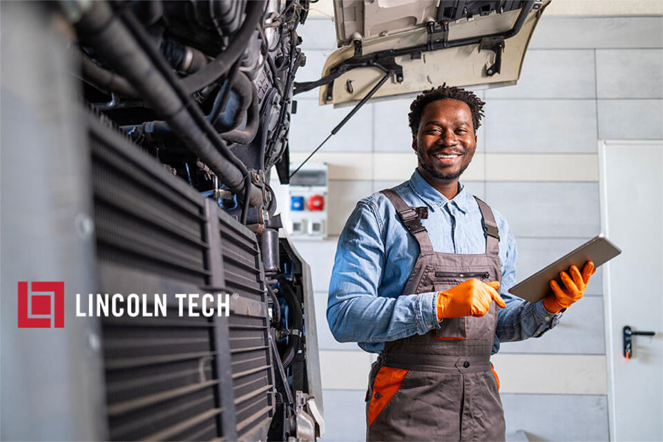 Diesel Mechanic in New Jersey maintaining a truck.