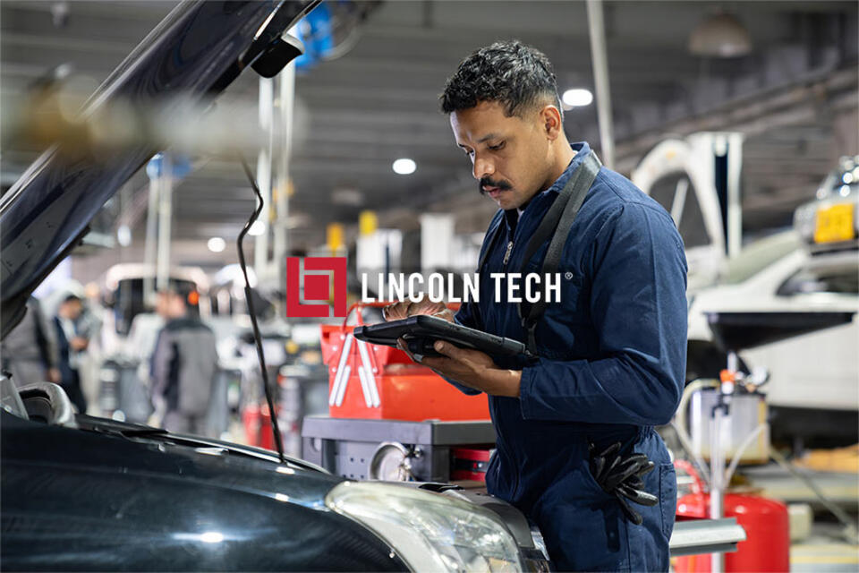 A mechanic in an auto repair shop.